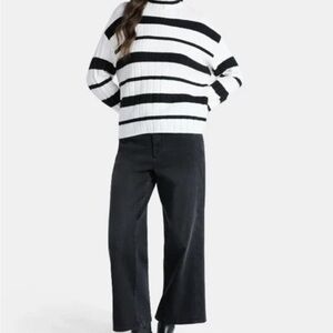Black and White Striped Sweater with Black Pants